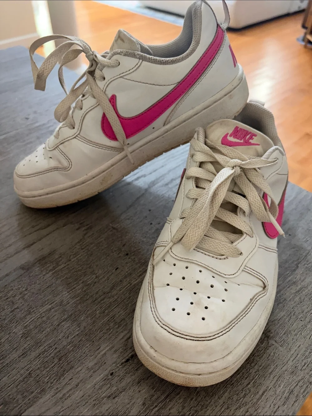 Nike Kids White Sneakers with Pink Swoosh